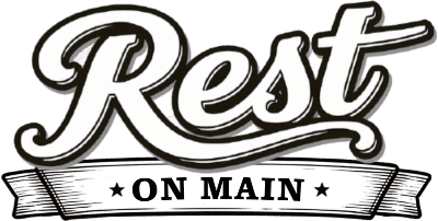 Logo featuring the words "Rest On Main" in a stylized font.
